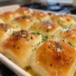 Juicy no yeast dinner rolls in a rustic setting, showcasing their inviting texture.