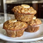 Juicy oat flour banana muffins, showcasing a soft and inviting appearance.