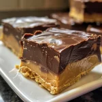 Delicious Chocolate Peanut Butter Squares neatly arranged, highlighting their rich texture.