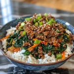 ['Close-up of Slow Cooker Korean Beef Spinach Rice in a bowl, showcasing colorful ingredients.', 'Juicy Korean beef with spinach and rice, presented in a vibrant dish from a side view.', 'A hearty serving of Slow Cooker Korean Beef Spinach Rice, highlighting rich colors and textures.', 'Side view of a delicious bowl of Korean beef rice with greens, featuring spices and vegetables.']