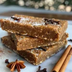 Close-up view of a chai spice protein bar on a white surface.