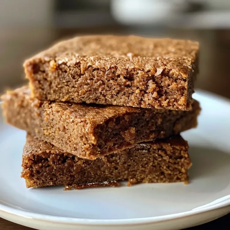 Delight in Every Bite: Crafting Easy Protein Gingerbread Close-up of moist Easy Protein Gingerbread, showcasing its rich texture and spices.