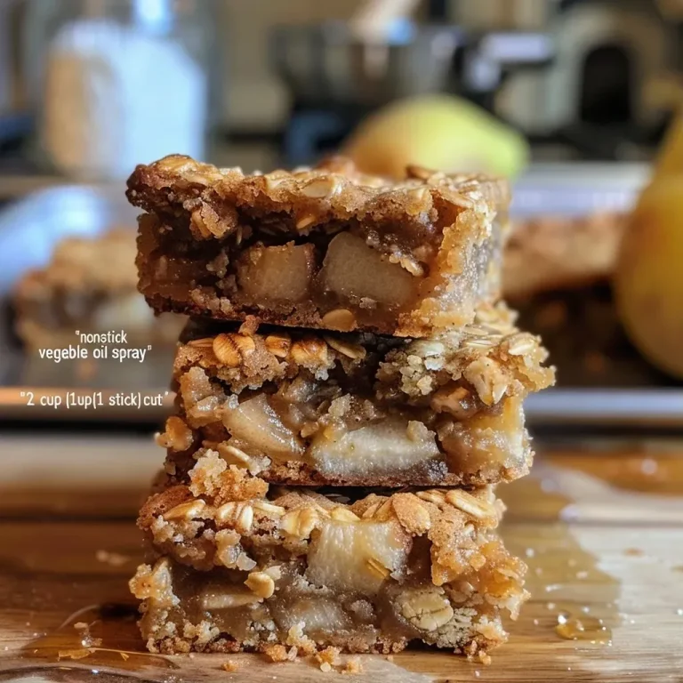 Close-up view of spiced oat and pear blondies showcasing their golden-brown texture.